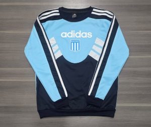 BUZO RACING RETRO CELESTE TALLES(L/XXL)